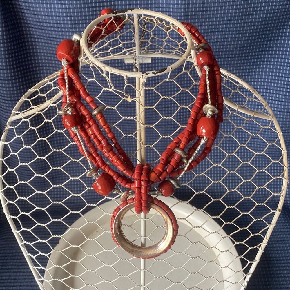 Chico’s 6-strand coral and silver bead necklace with circular pendant